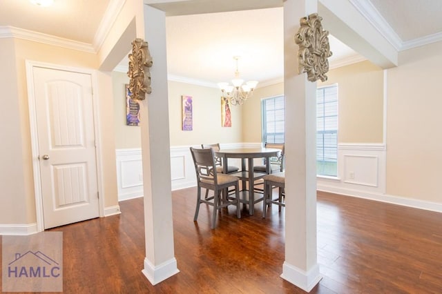 dining space featuring a notable chandelier, ornamental molding, and dark wood-type flooring