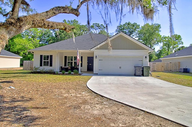 404 Talmadge Rd, Allenhurst, GA 31301 - ranch-style house featuring driveway and an attached garage