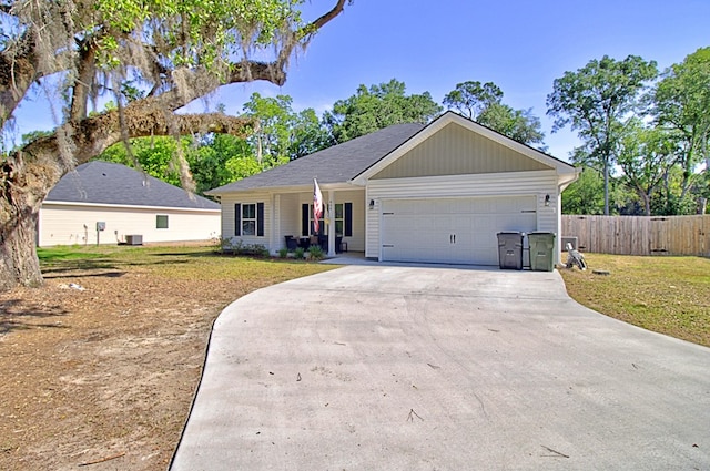404 Talmadge Rd, Allenhurst, GA 31301 - ranch-style house featuring concrete driveway and a garage