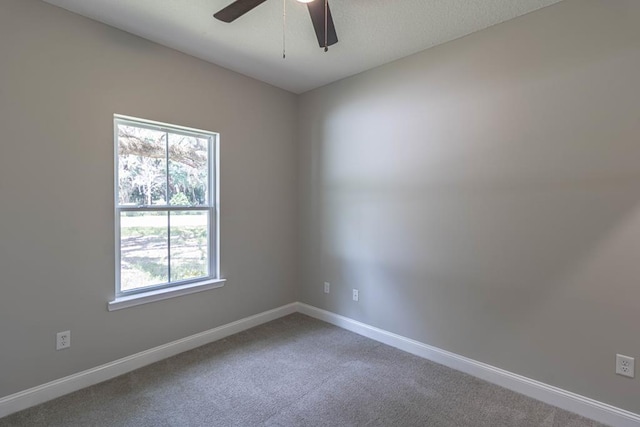 404 Talmadge Rd, Allenhurst, GA 31301 - unfurnished room with carpet floors and ceiling fan