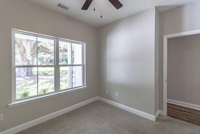 404 Talmadge Rd, Allenhurst, GA 31301 - unfurnished bedroom featuring carpet floors and ceiling fan