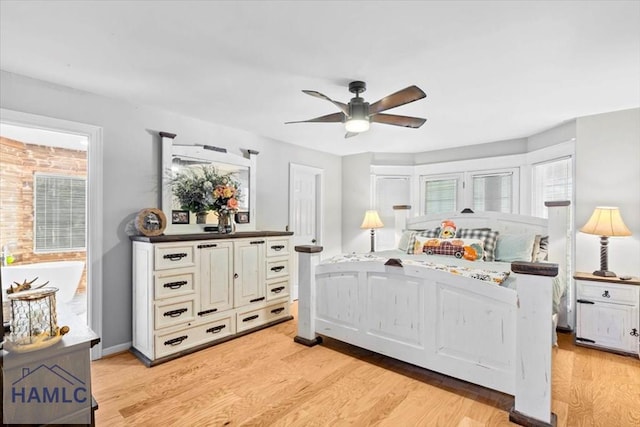 bedroom featuring ceiling fan and light hardwood / wood-style floors