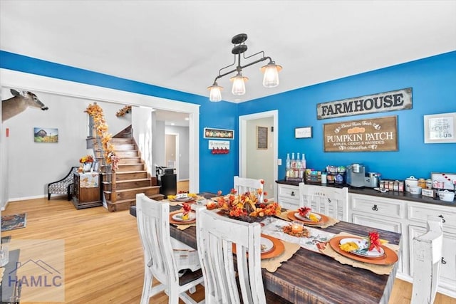 dining room with light hardwood / wood-style floors