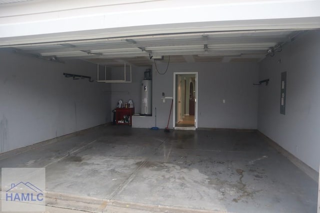 garage featuring electric panel and electric water heater