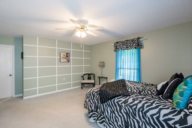 bedroom with ceiling fan and carpet