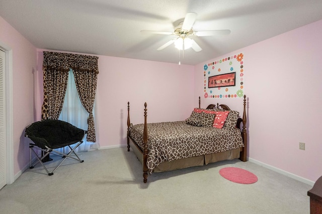 carpeted bedroom featuring ceiling fan