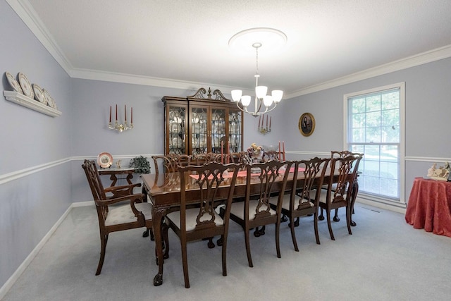 carpeted dining space featuring a notable chandelier and ornamental molding