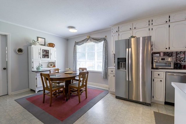 dining room featuring ornamental molding