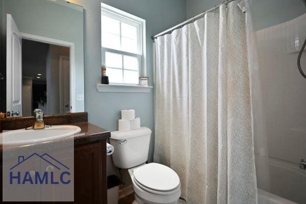 246 Cumberland Dr NE, Ludowici, GA 31316 - full bathroom with vanity and shower / tub combo with curtain