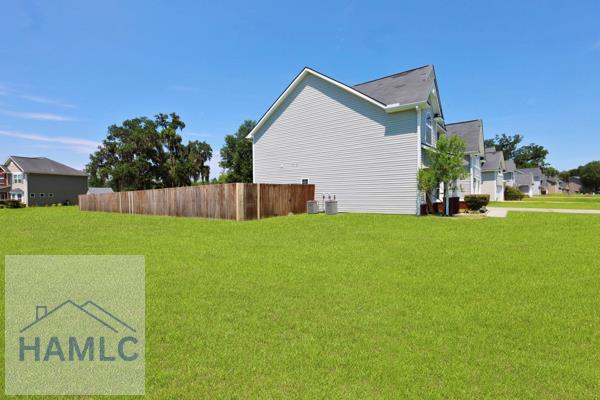 246 Cumberland Dr NE, Ludowici, GA 31316 - view of side of property