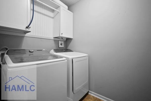 246 Cumberland Dr NE, Ludowici, GA 31316 - washroom with cabinet space and separate washer and dryer