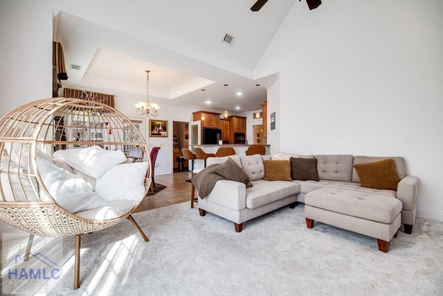 86 Brigham Dr, Richmond Hill, GA 31324 - living room with light carpet, a chandelier, a ceiling fan, recessed lighting, and baseboards
