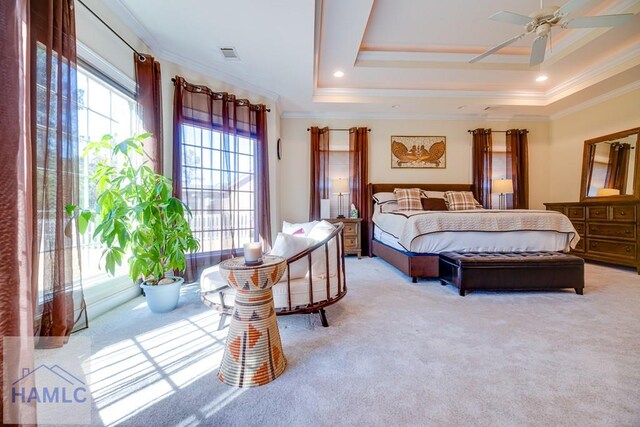 86 Brigham Dr, Richmond Hill, GA 31324 - bedroom with crown molding, light colored carpet, and a raised ceiling