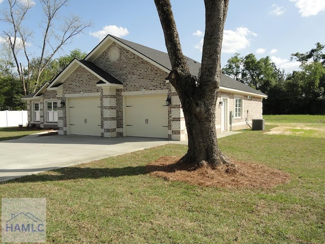 view of front of property featuring concrete driveway, brick siding, a front yard, and a garage