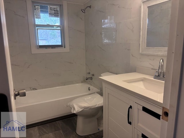 full bathroom featuring bathing tub / shower combination, toilet, tile walls, and vanity