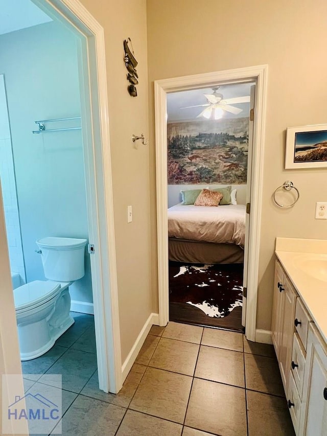 750 Littlefield St, Jesup, GA 31546 - bathroom featuring vanity, tile patterned flooring, ceiling fan, and ensuite bath