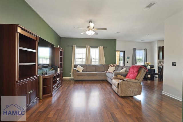 189 Morningside Dr, Allenhurst, GA 31313 - living area featuring a ceiling fan, dark wood-style flooring, and baseboards