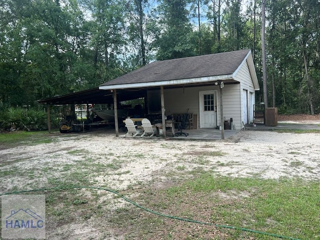 189 Sooner Dr, Jesup, GA 31545 - view of outbuilding featuring a carport