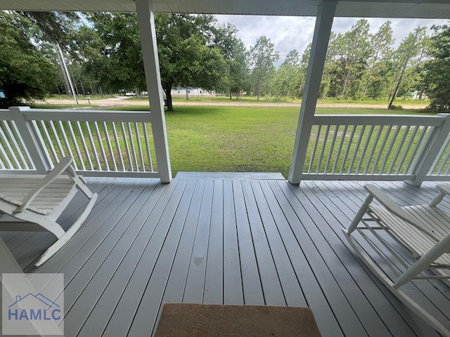 189 Sooner Dr, Jesup, GA 31545 - wooden deck featuring a yard