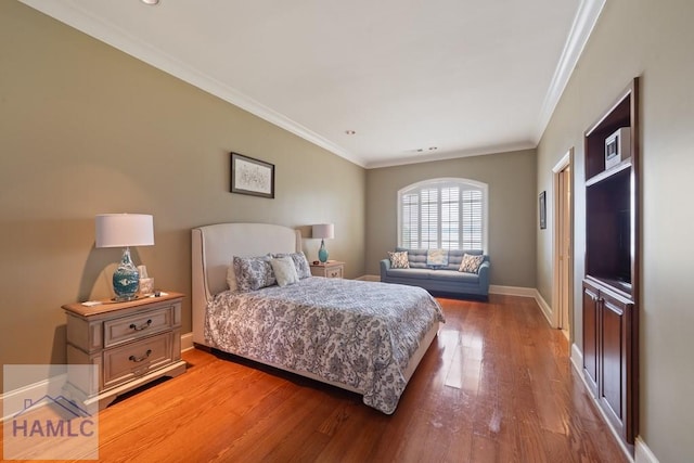 745 Chickasaw Trl, Sparta, GA 31087 - bedroom featuring light wood finished floors, ornamental molding, and baseboards