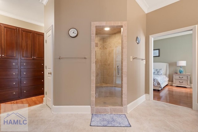 745 Chickasaw Trl, Sparta, GA 31087 - full bath with crown molding, a shower stall, tile patterned floors, baseboards, and ensuite bathroom
