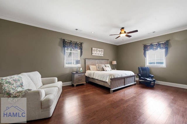 745 Chickasaw Trl, Sparta, GA 31087 - bedroom with multiple windows, crown molding, dark wood-type flooring, baseboards, and ceiling fan