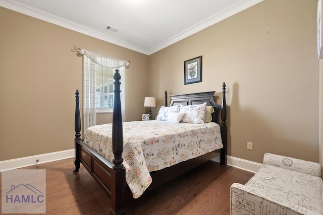745 Chickasaw Trl, Sparta, GA 31087 - bedroom with baseboards, crown molding, and dark wood-style flooring