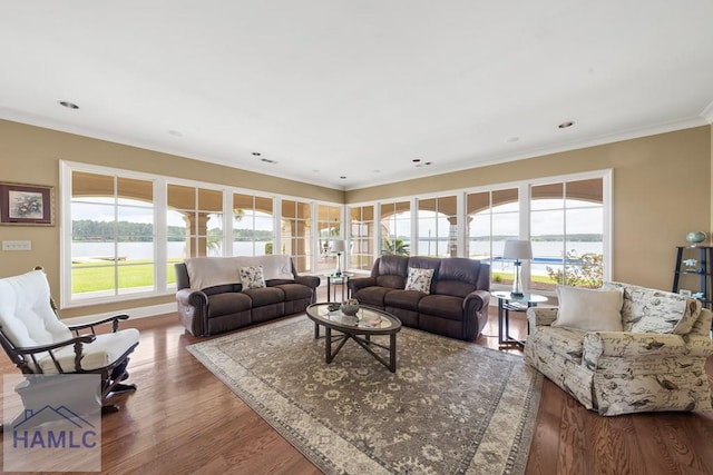 745 Chickasaw Trl, Sparta, GA 31087 - living area featuring crown molding, wood finished floors, and a water view