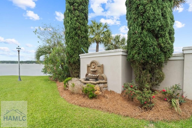 745 Chickasaw Trl, Sparta, GA 31087 - community sign featuring a yard and a water view