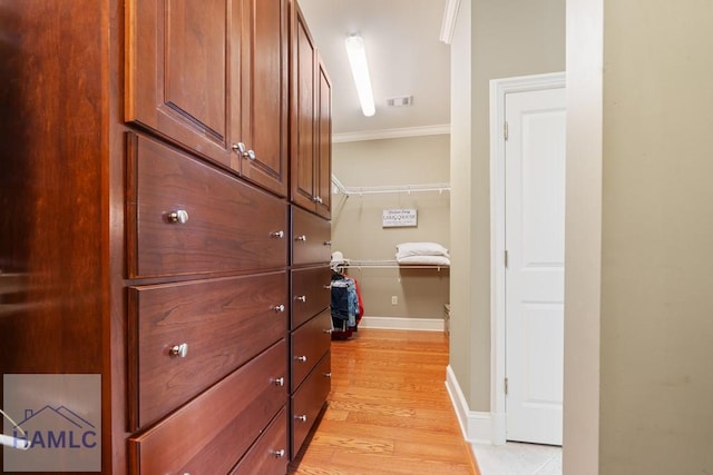 745 Chickasaw Trl, Sparta, GA 31087 - corridor with ornamental molding, baseboards, and light wood-type flooring
