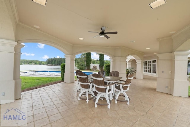 745 Chickasaw Trl, Sparta, GA 31087 - view of patio / terrace with a ceiling fan, outdoor dining space, and a water view