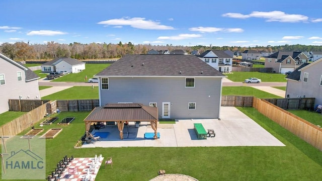 back of property featuring a gazebo, a fenced backyard, a patio area, and a residential view