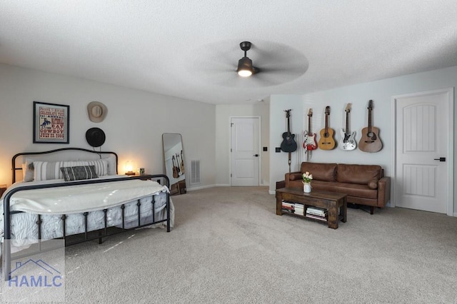 99 Scarlett Ln, Richmond Hill, GA 31324 - carpeted bedroom with a ceiling fan and a textured ceiling