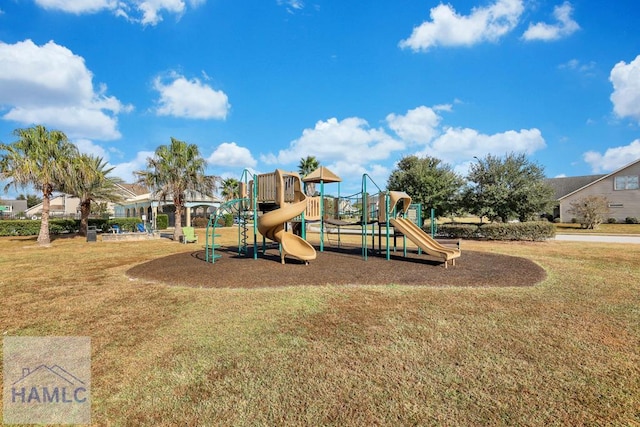 99 Scarlett Ln, Richmond Hill, GA 31324 - community jungle gym featuring a lawn