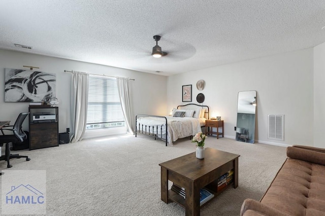 99 Scarlett Ln, Richmond Hill, GA 31324 - carpeted bedroom featuring a textured ceiling, a ceiling fan, and an office area