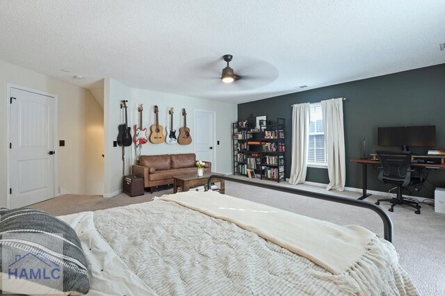 99 Scarlett Ln, Richmond Hill, GA 31324 - bedroom with carpet, an office area, a textured ceiling, and a ceiling fan