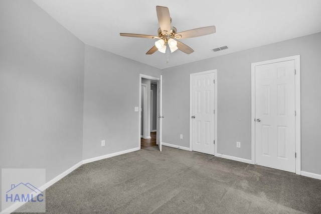 unfurnished bedroom with carpet flooring and ceiling fan