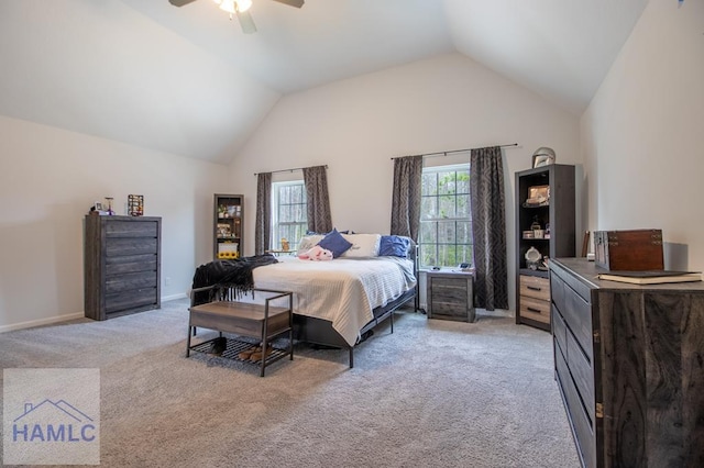 bedroom featuring ceiling fan, light carpet, and lofted ceiling