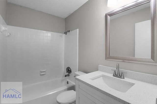 905 Greenbriar Rd, Hinesville, GA 31313 - full bath with toilet, vanity, a textured ceiling, and shower / tub combination