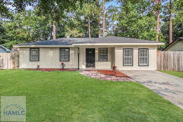 905 Greenbriar Rd, Hinesville, GA 31313 - ranch-style house with driveway and a shingled roof