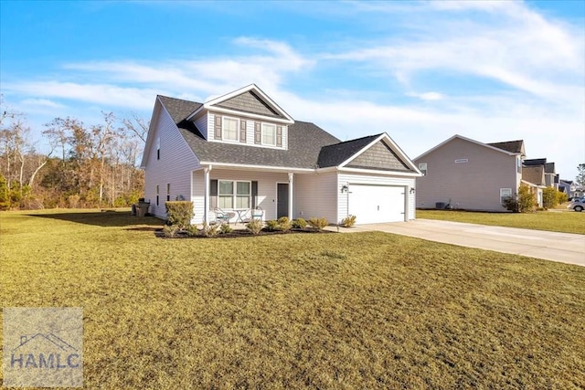 traditional home with driveway, a garage, a porch, and a front yard