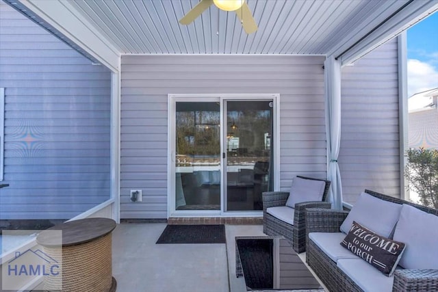 view of patio / terrace with an outdoor living space and a ceiling fan