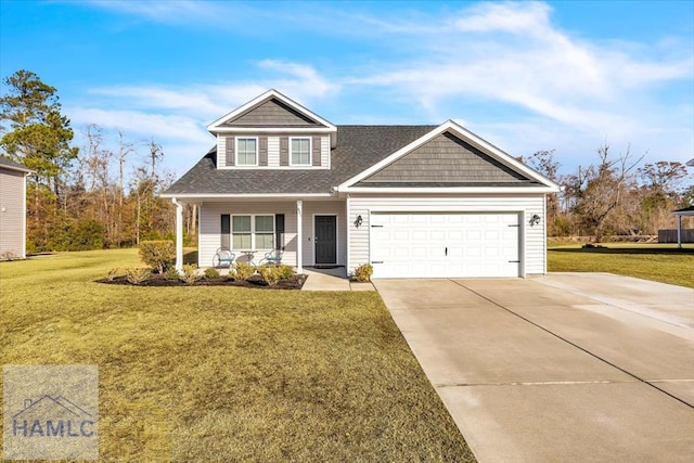 view of front of house featuring a front yard, concrete driveway, a porch, and an attached garage