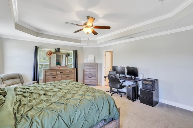 bedroom with light colored carpet, a raised ceiling, ceiling fan, and crown molding