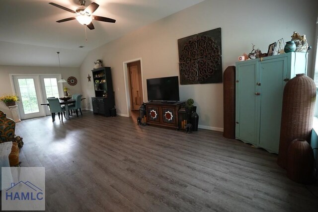 613 Macon St, Ludowici, GA 31316 - living area with ceiling fan, wood finished floors, lofted ceiling, and baseboards