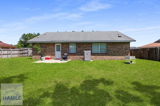926 Poppleton Dr, Hinesville, GA 31313 - rear view of property featuring a patio area, brick siding, and central AC unit
