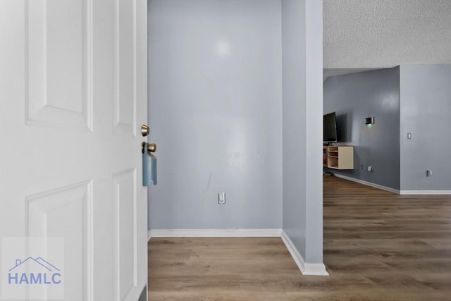 926 Poppleton Dr, Hinesville, GA 31313 - hall featuring wood finished floors and baseboards