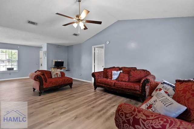 926 Poppleton Dr, Hinesville, GA 31313 - living area with wood finished floors, baseboards, vaulted ceiling, and ceiling fan