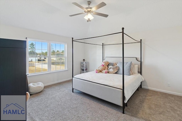 bedroom with ceiling fan and carpet