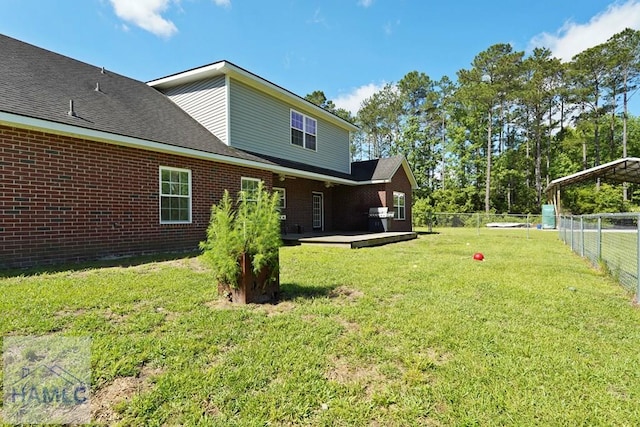 1653 Hawthorne Rd, Townsend, GA 31331 - view of yard featuring a wooden deck and a detached carport